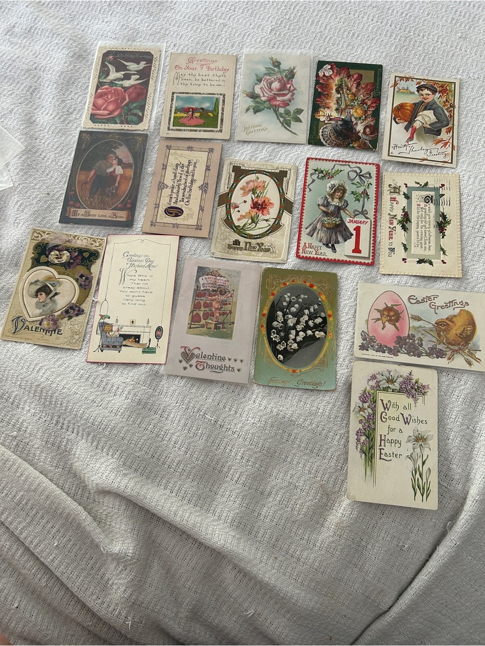 16 antique early 1900’s postcards various holidays.